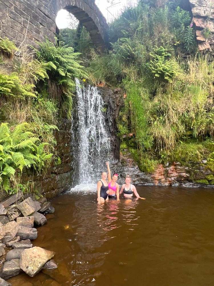 Solna walkers in a Lake District waterfall pool