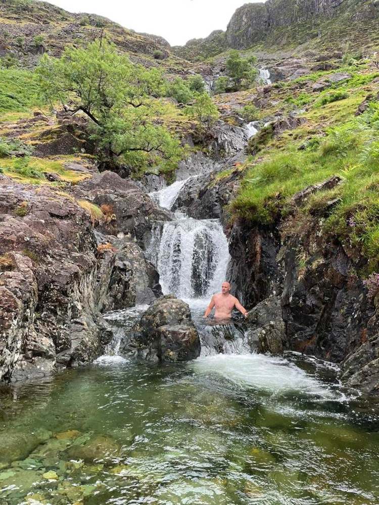Solna walkers in a Lake District waterfall pool