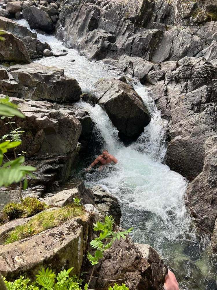 Solna walkers in a Lake District waterfall pool