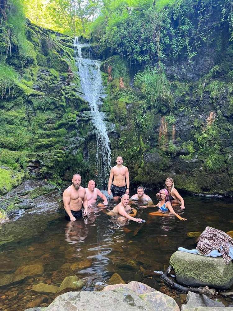 The Solna group in a waterfall pool in the Lake District