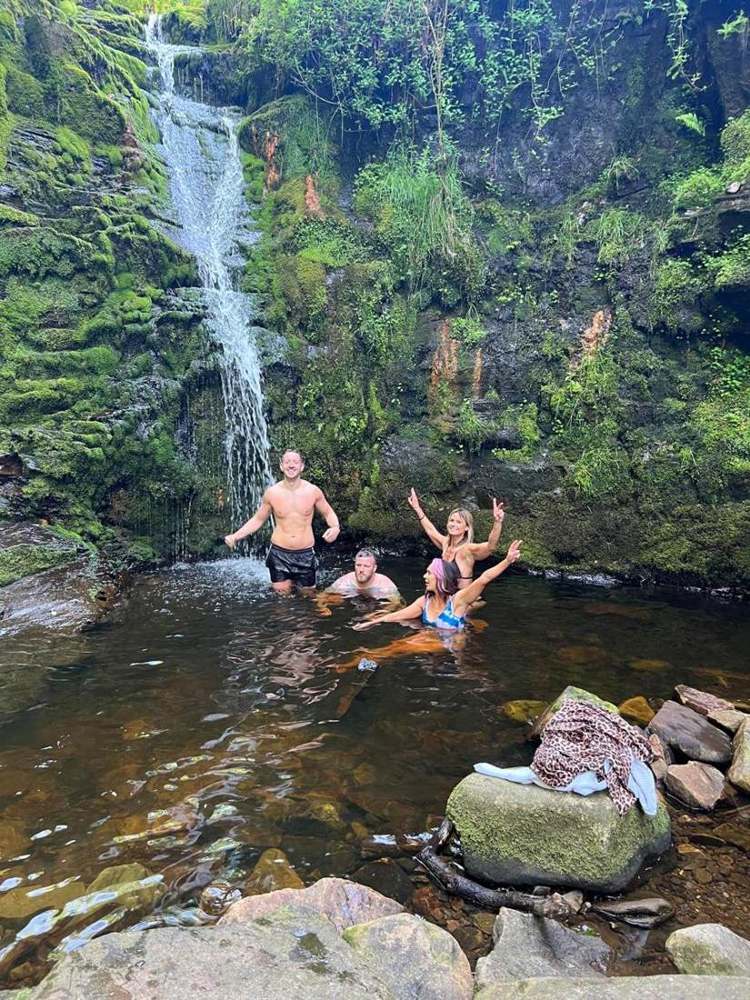 Solna walkers in a Lake District waterfall pool