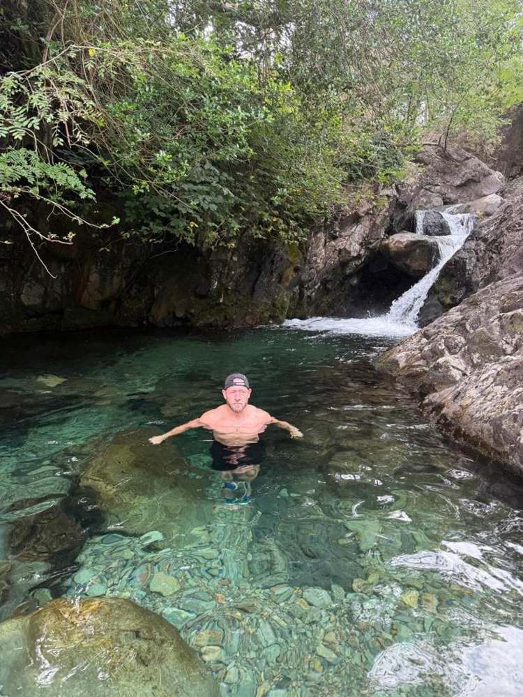 Solna walkers in a Lake District waterfall pool