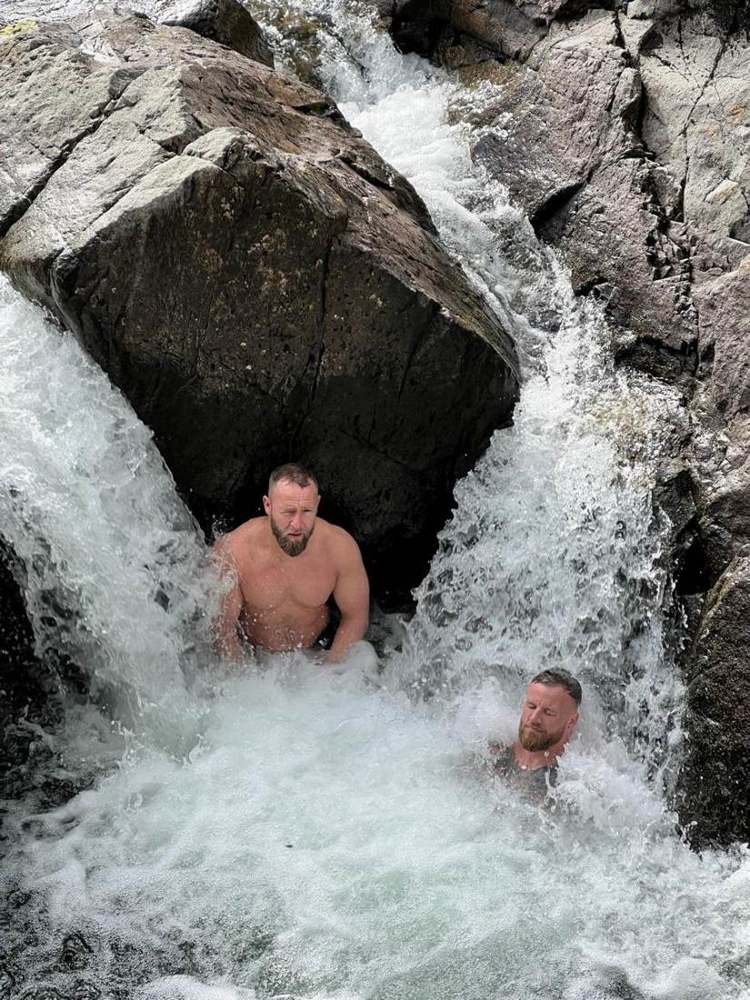 Solna walkers in a Lake District waterfall pool