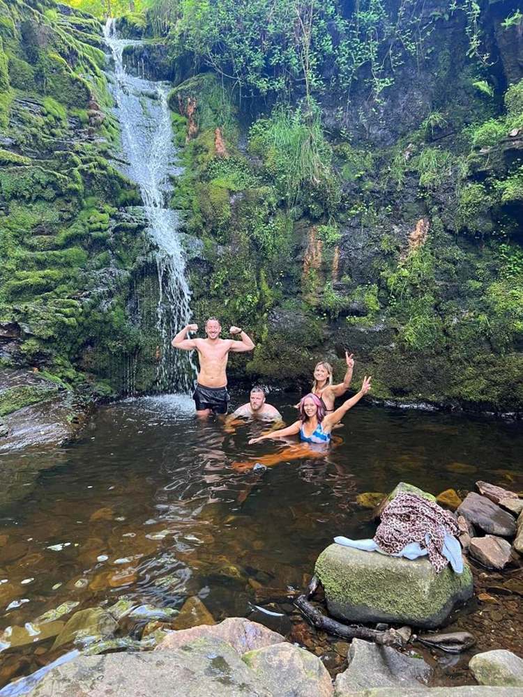 Solna walkers in a Lake District waterfall pool