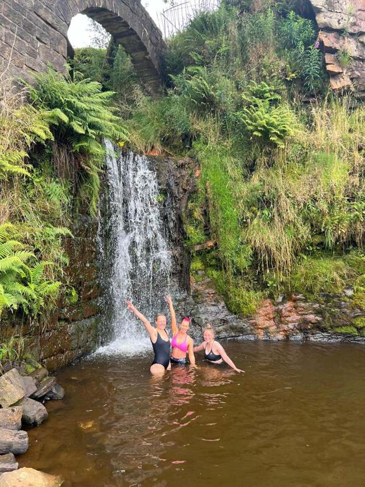 Solna walkers in a Lake District waterfall pool