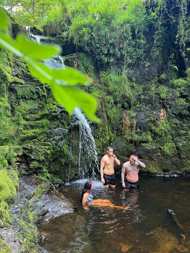 Solna walkers in a Lake District waterfall pool