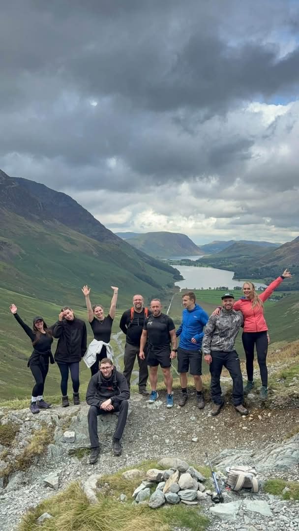 The Solna group at a cairn high above Buttermere, with Crummock Water beyond